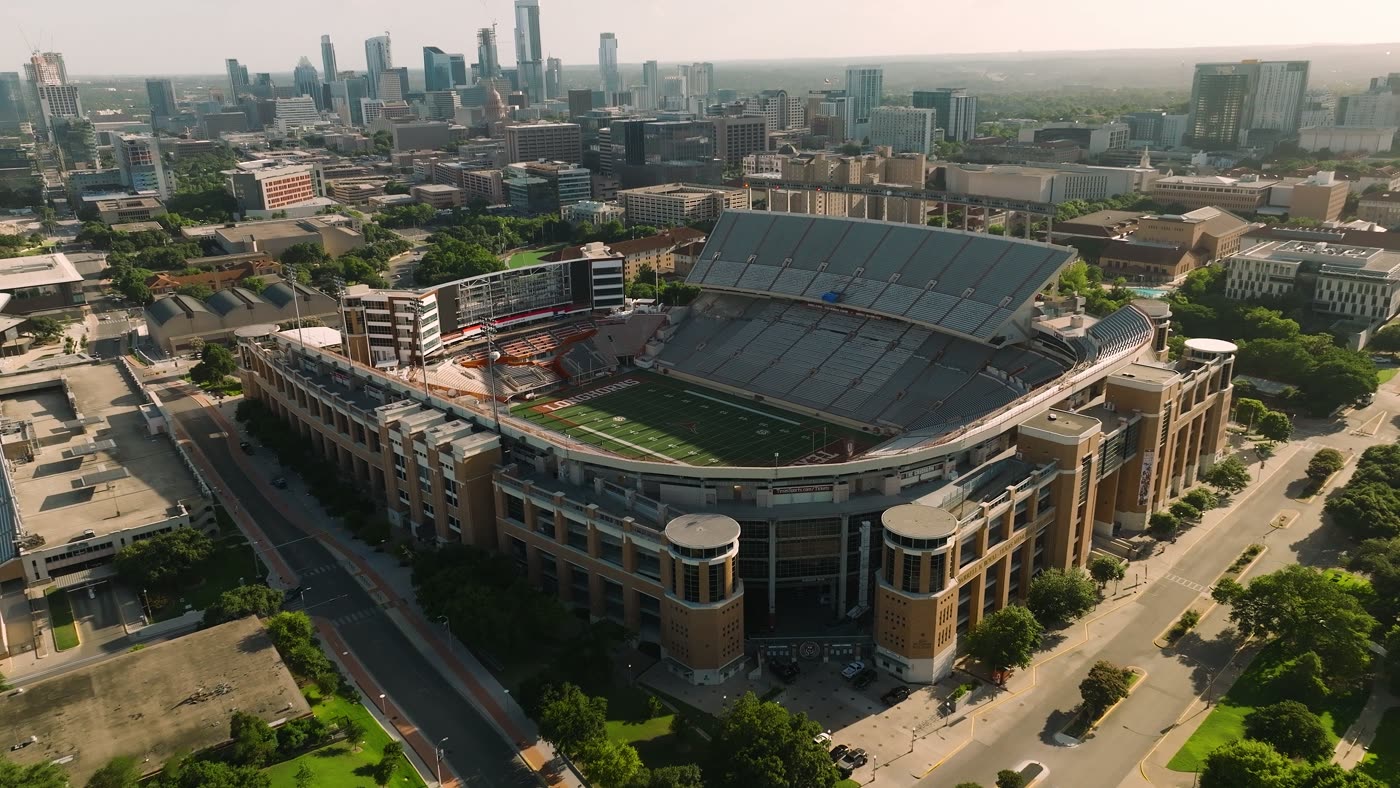 Aerial view of the University of Texas at Austin with the city behind