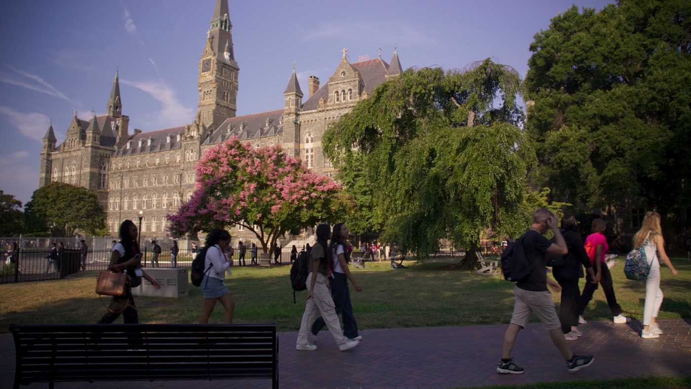 Students walking past Healy Hall at Georgetown University